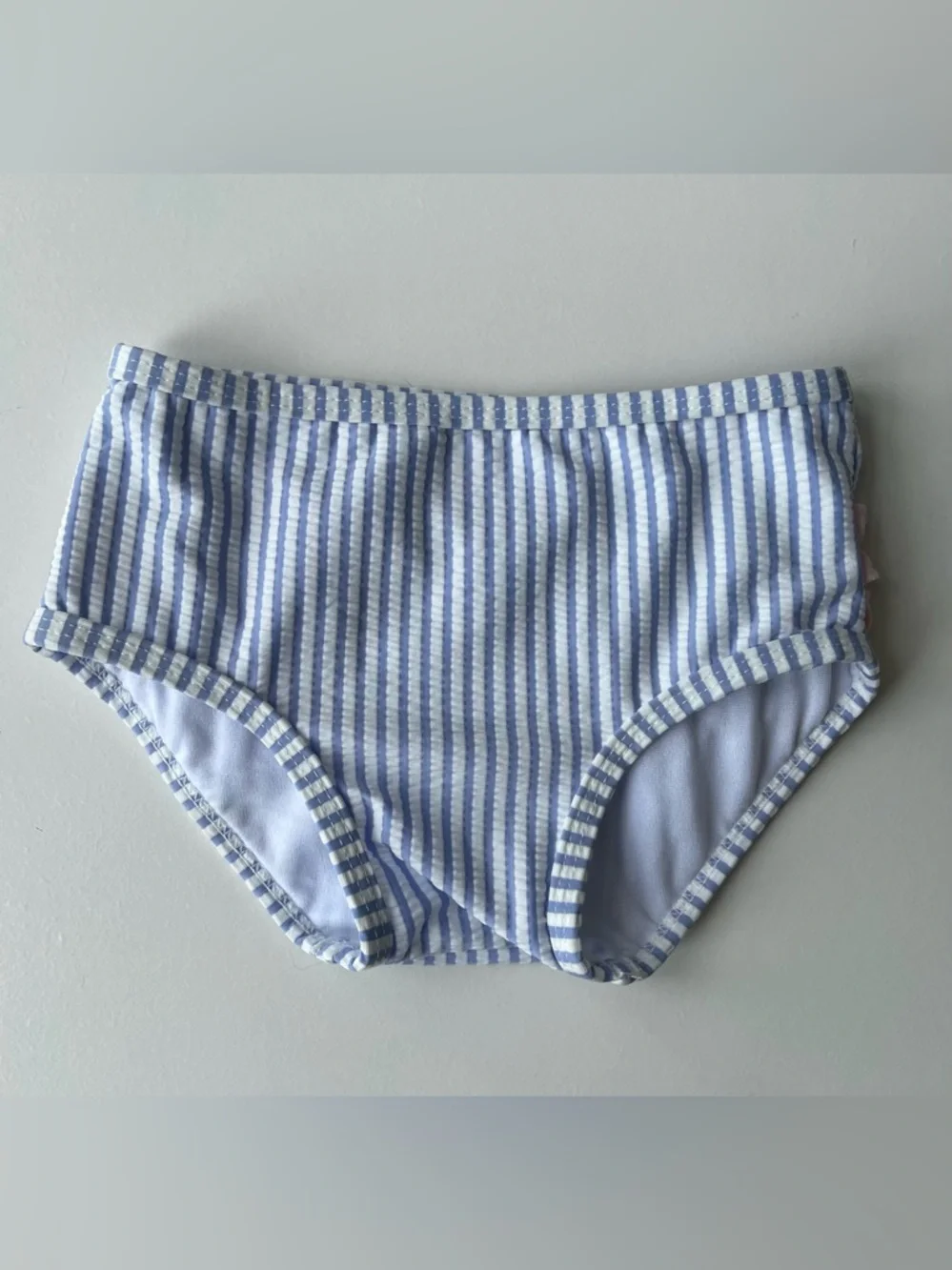 RuffleButts Blue Seersucker Two-Piece Swimsuit with Pink Polka Dot Ruffles